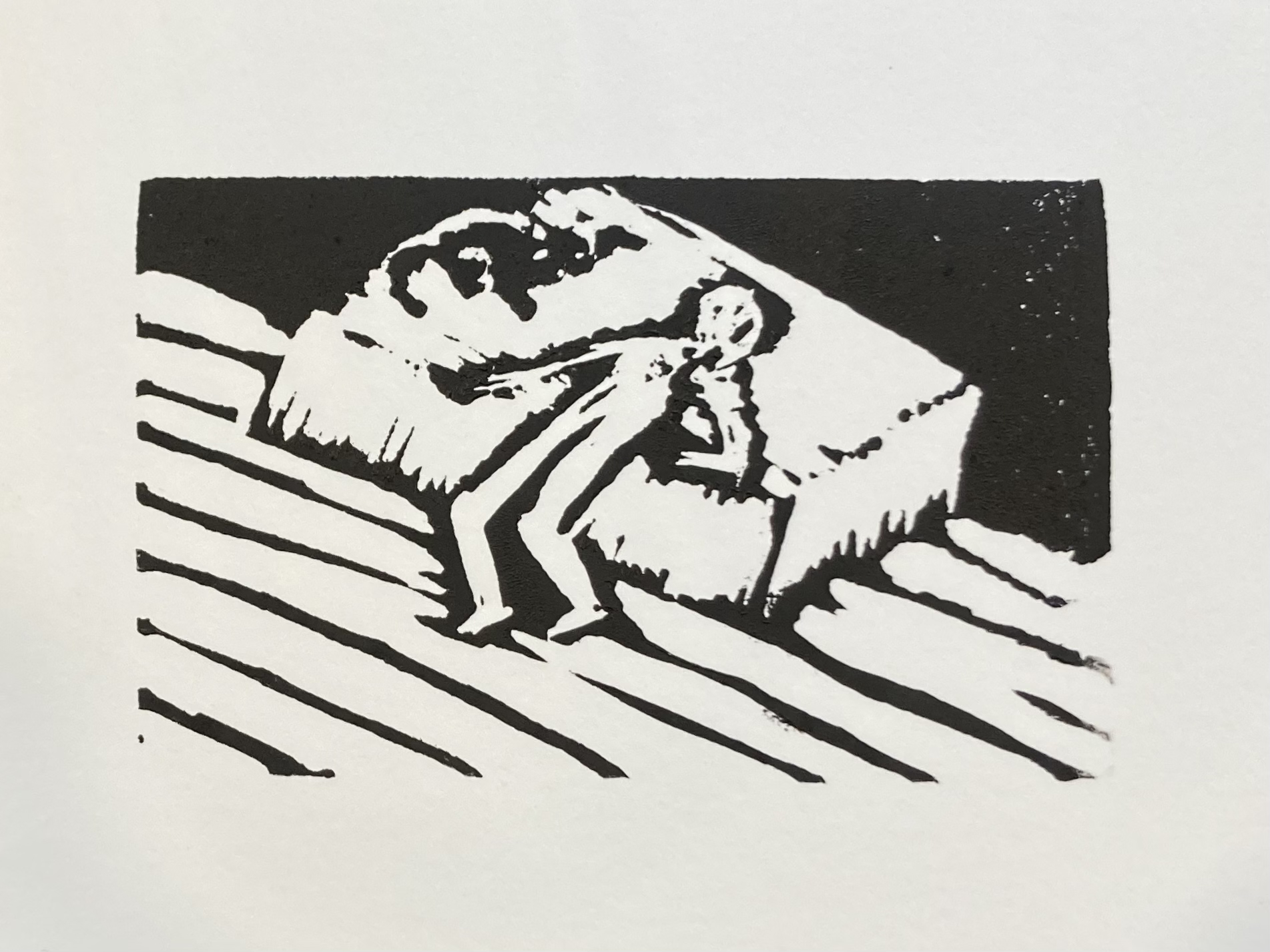 Print of man hanging off bed